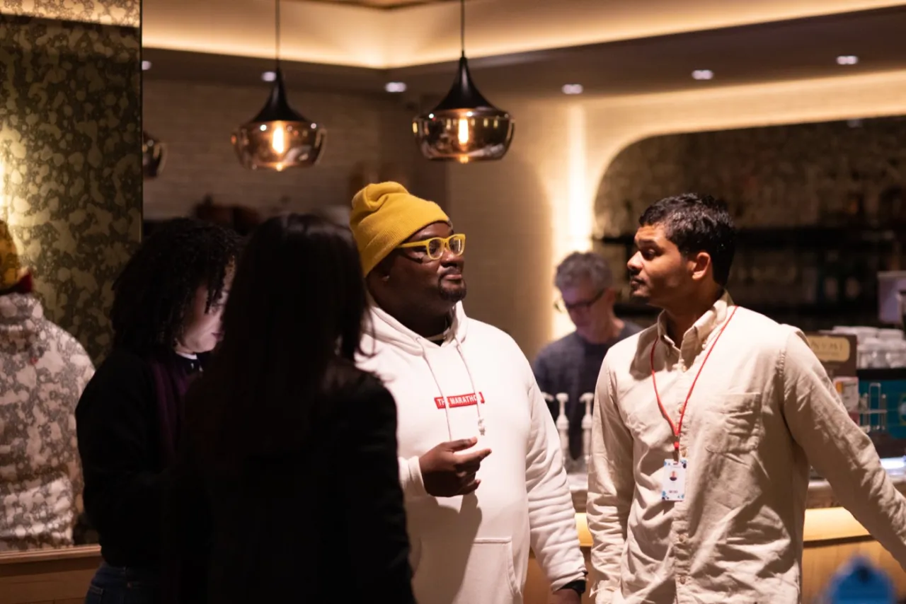 The director in conversation with a cast member during production.